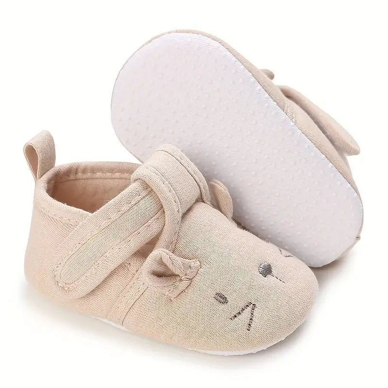 Zapato para bebe, dibujo animado color caqui